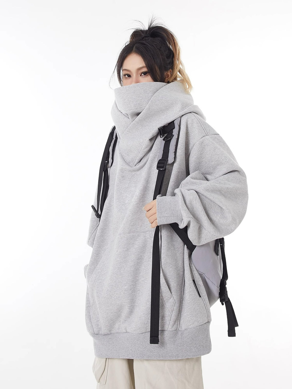 Sweat à capuche doublé en polaire à col haut et coupe ample
